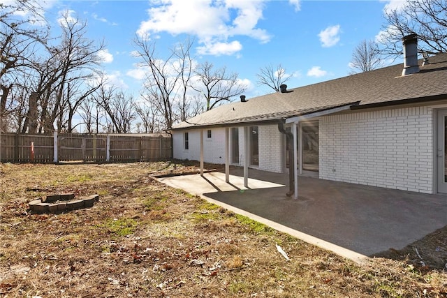 rear view of property with a patio area