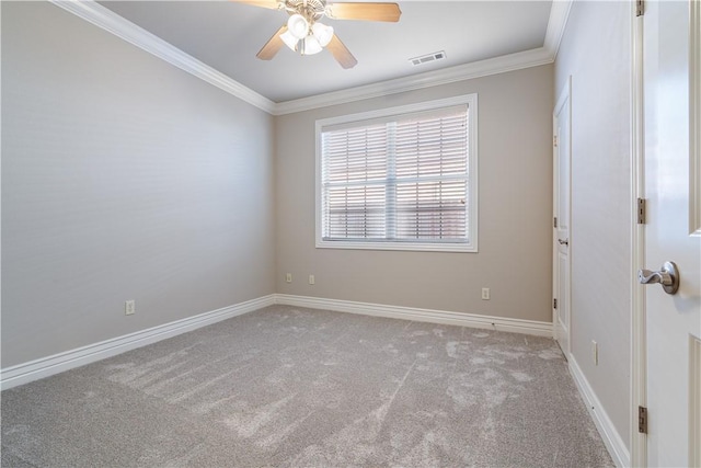 empty room featuring light colored carpet, ceiling fan, and ornamental molding