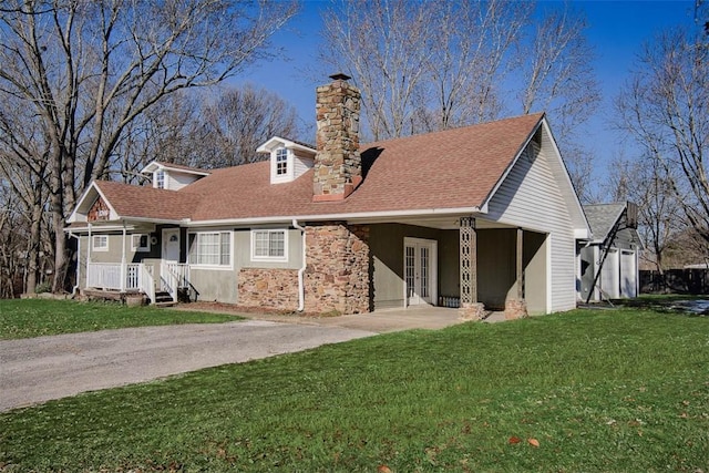 exterior space featuring a carport and a yard