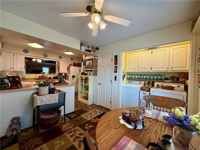 dining room with separate washer and dryer and ceiling fan