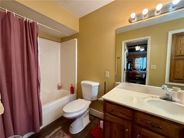 full bathroom with toilet, vanity, shower / tub combo with curtain, and hardwood / wood-style flooring