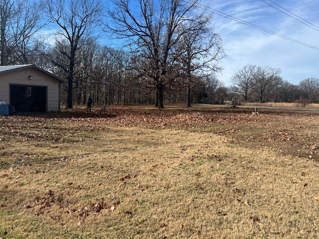 view of yard featuring a garage