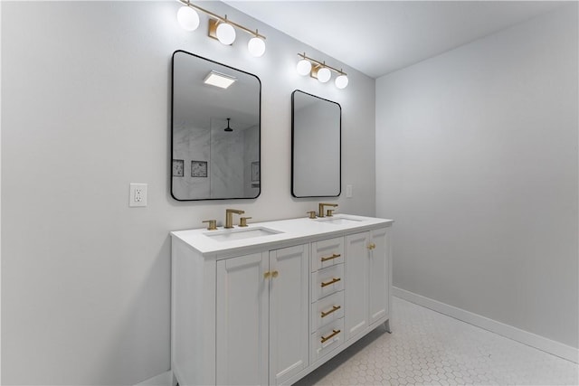 bathroom with vanity and tile patterned flooring