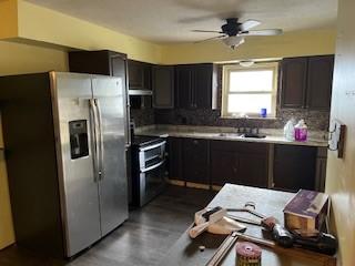 kitchen with ceiling fan, tasteful backsplash, dark brown cabinets, ventilation hood, and appliances with stainless steel finishes