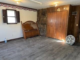 interior space with dark wood-type flooring