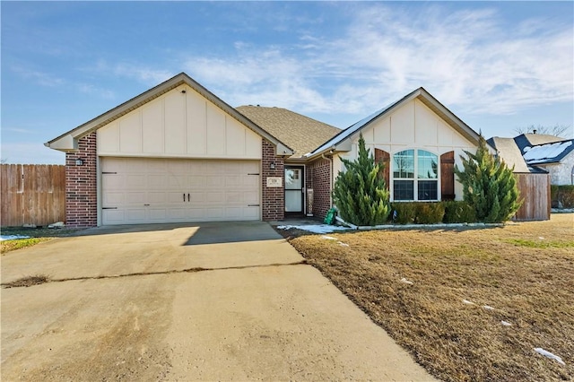 single story home featuring a front lawn and a garage