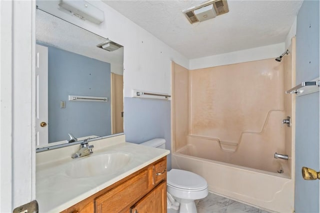 full bathroom featuring a textured ceiling, shower / tub combination, vanity, and toilet