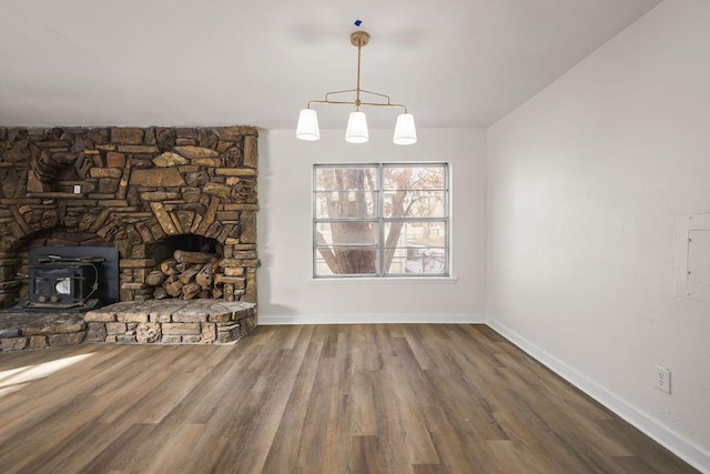 unfurnished living room with hardwood / wood-style flooring