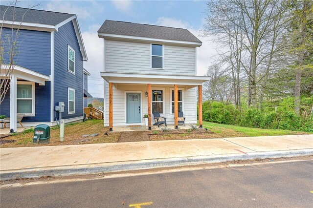 view of front of property featuring covered porch