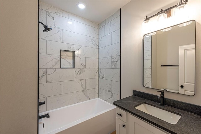 bathroom with recessed lighting, shower / washtub combination, and vanity