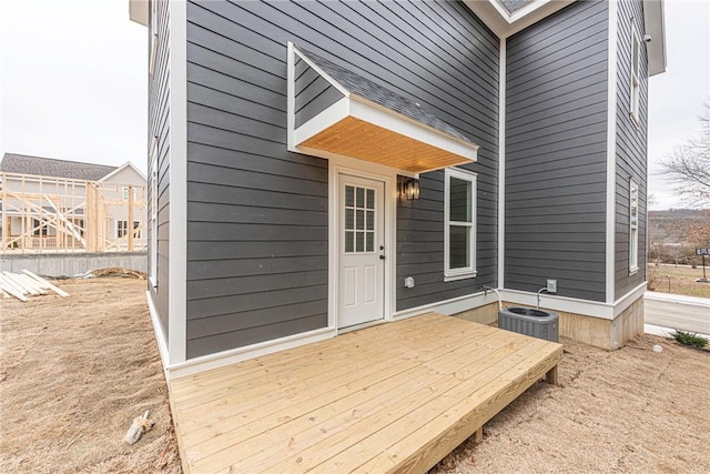 wooden terrace with central air condition unit