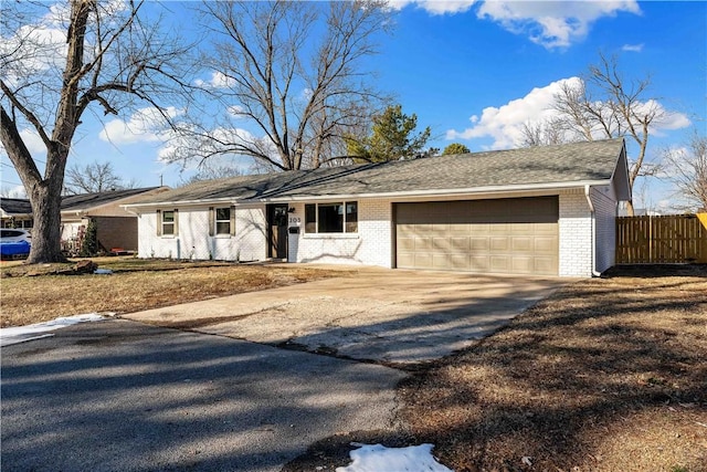 single story home featuring a garage