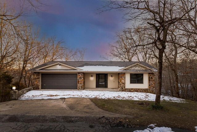 ranch-style home with a garage