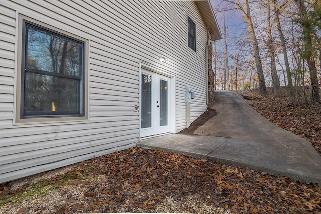 view of property exterior with french doors