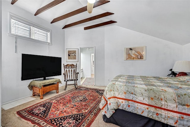 bedroom with ceiling fan, carpet, and vaulted ceiling with beams