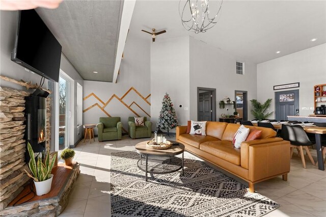 510 Chisholm Trl, Forsyth, MO 65653 - living room with a fireplace and a chandelier