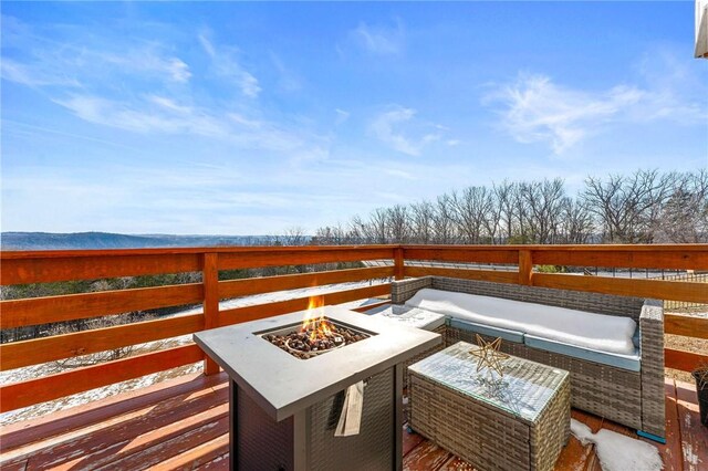 510 Chisholm Trl, Forsyth, MO 65653 - wooden terrace with an outdoor fire pit