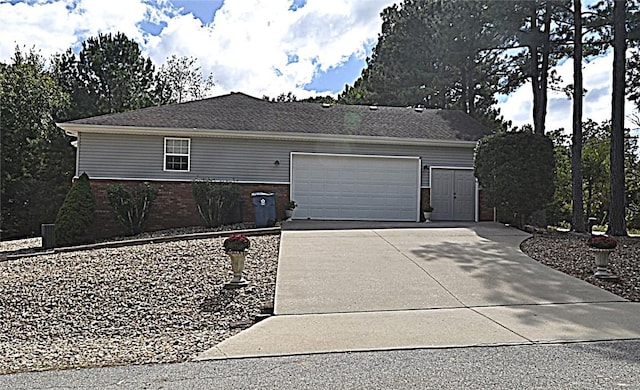 view of side of property with a garage