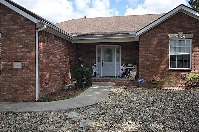 doorway to property featuring a porch