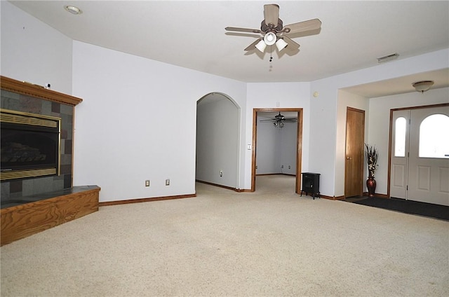 unfurnished living room with carpet flooring