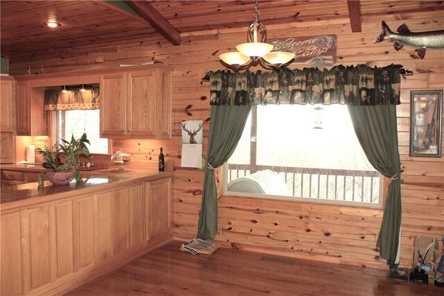 7 Viewpoint Dr, Eureka Springs, AR 72631 - dining room featuring wood walls, wood finished floors, beam ceiling, and wooden ceiling