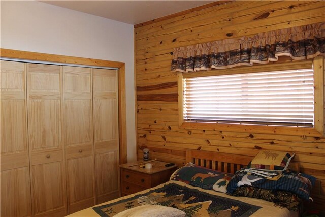 7 Viewpoint Dr, Eureka Springs, AR 72631 - bedroom featuring wood walls and a closet