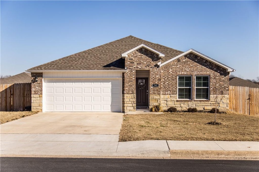 ranch-style house with a garage