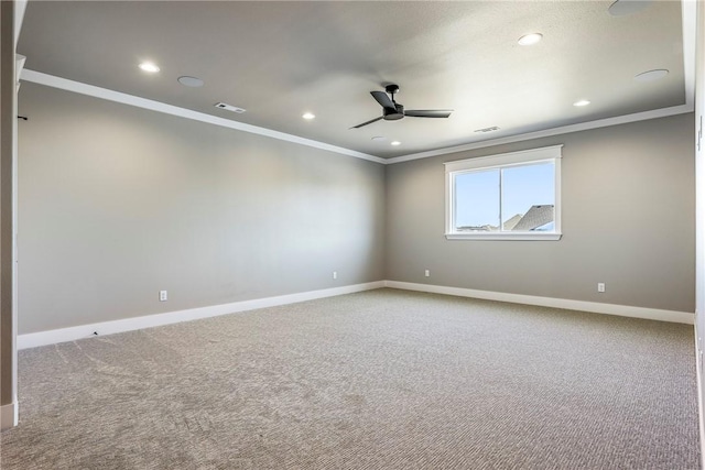 spare room featuring ceiling fan, ornamental molding, and carpet floors