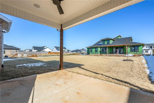 exterior space featuring ceiling fan