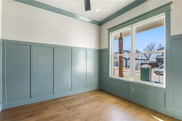 spare room featuring light wood-type flooring