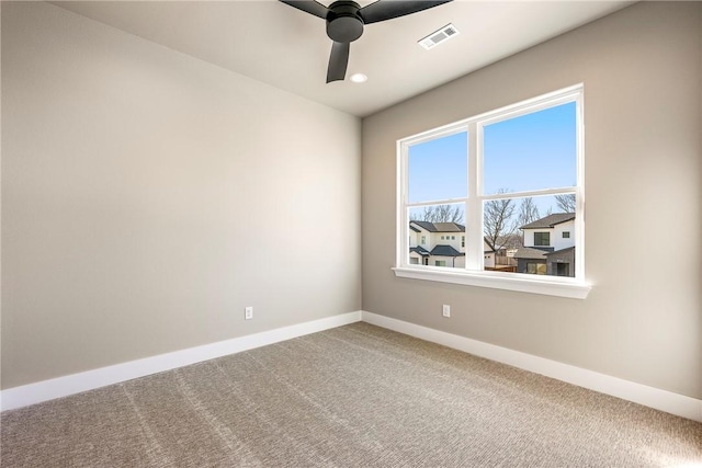 carpeted empty room with ceiling fan