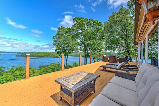 deck featuring a water view