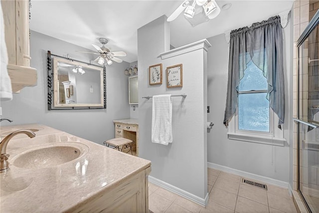 bathroom with vanity, ceiling fan, tile patterned floors, and an enclosed shower