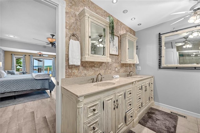 bathroom featuring decorative backsplash and vanity