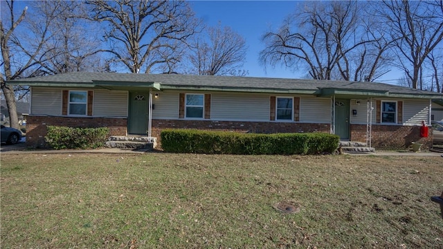 ranch-style home featuring a front yard