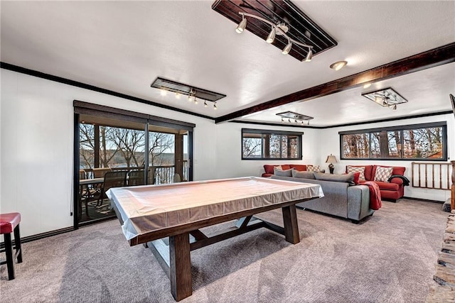 playroom with light colored carpet, ornamental molding, beam ceiling, and pool table