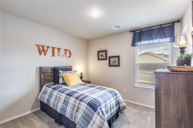 1412 NW 5th Ave, Highfill, AR 72734 - carpeted bedroom featuring visible vents and baseboards