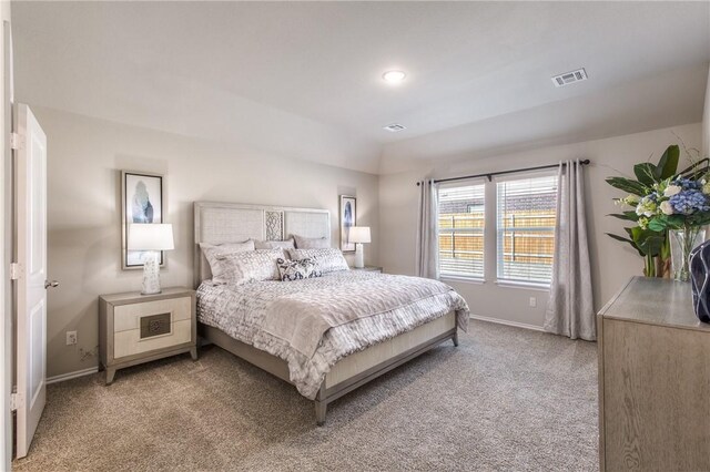 1412 NW 5th Ave, Highfill, AR 72734 - bedroom with baseboards, visible vents, and light colored carpet