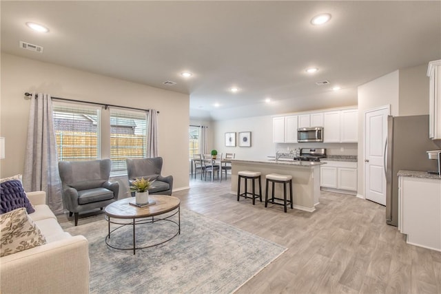 living room featuring light hardwood / wood-style flooring