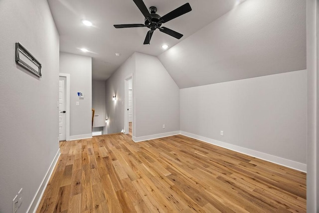 bonus room featuring ceiling fan, light hardwood / wood-style flooring, and lofted ceiling