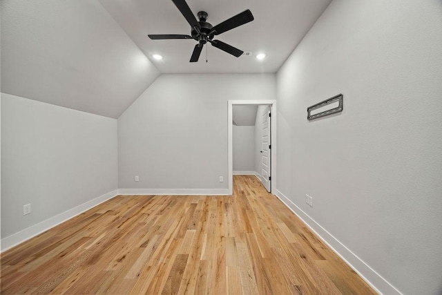 bonus room featuring ceiling fan, light hardwood / wood-style flooring, and lofted ceiling