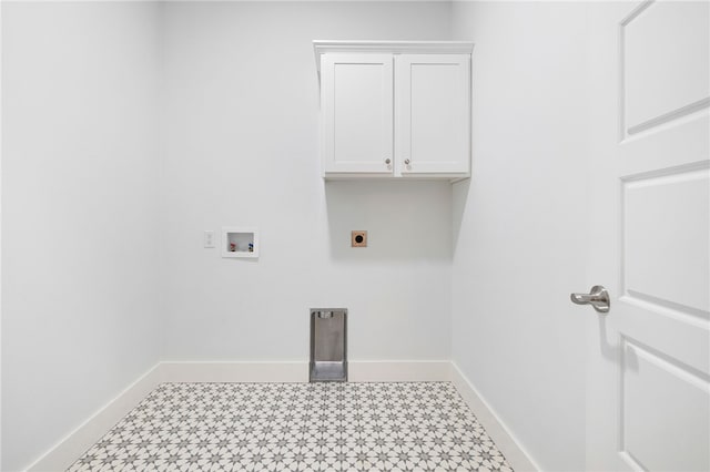 29 Shanklin Dr, Bella Vista, AR 72715 - washroom featuring electric dryer hookup, tile patterned floors, hookup for a washing machine, and cabinet space
