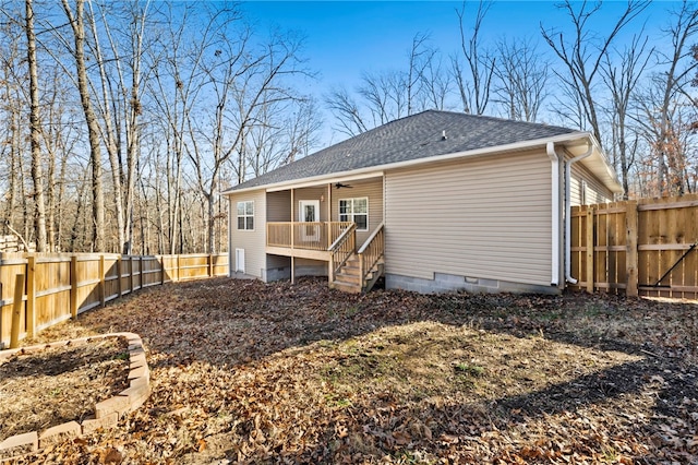 29 Shanklin Dr, Bella Vista, AR 72715 - back of house with a ceiling fan, roof with shingles, a fenced backyard, and crawl space