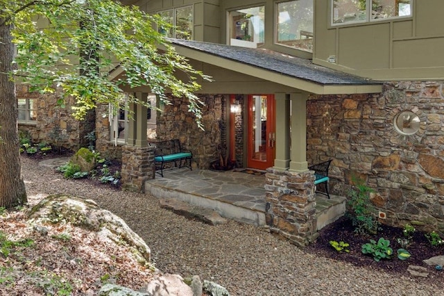 property entrance with covered porch