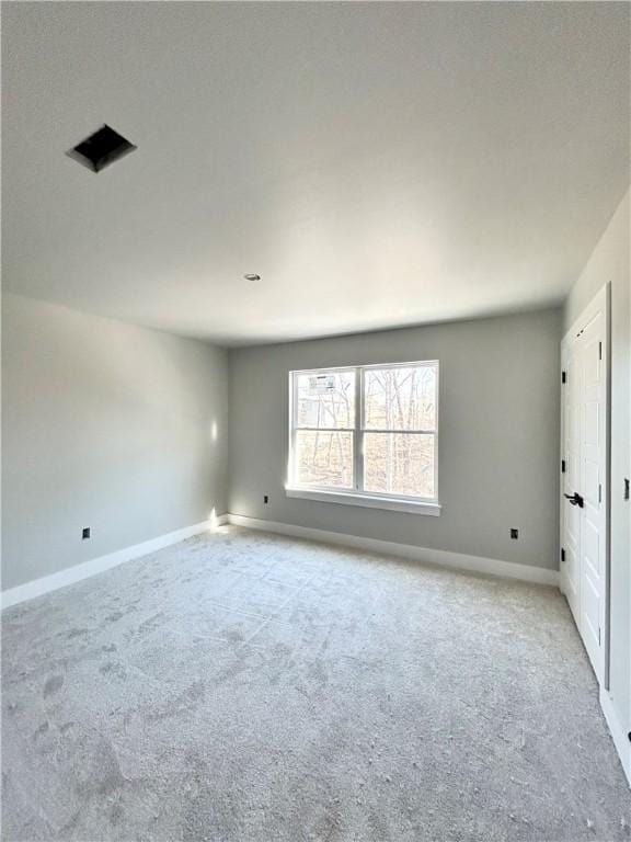 view of carpeted spare room