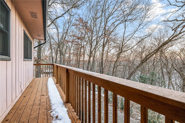 view of snow covered deck