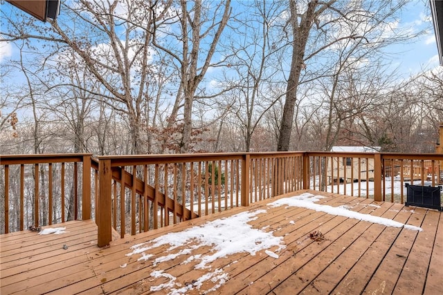 view of snow covered deck