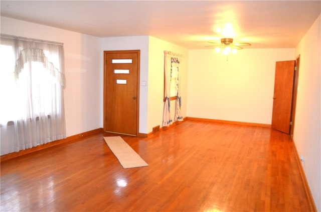 entryway featuring ceiling fan and hardwood / wood-style flooring