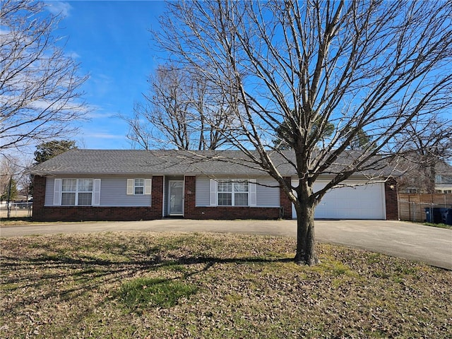 210 NW G St, Bentonville, AR 72712 - ranch-style house with a garage