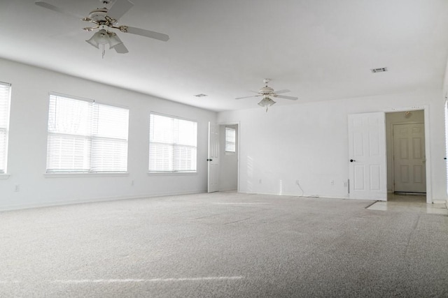 unfurnished room with ceiling fan